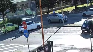 Man Crossing The Roads Meets A Speeding Car