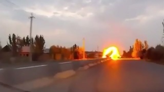 A car crashes, explodes and flips