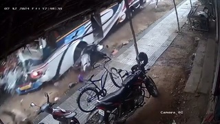 A bus hits two people