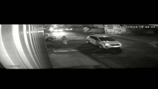 A careless or blind driver runs over a woman crossing the street