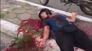 A motorcyclist throat is cut by a wire