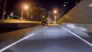 A motorcyclist rear-ends a car at high speed