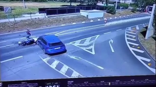 A car pulls out in front of a motorcycle