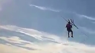 A parasailer has a harness malfunction