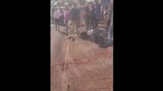 A motorcyclist T-bones a car and flips it