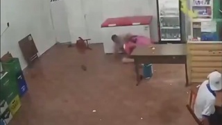 Dude ends the fight without setting down his beer