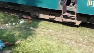 Two people are hit by a train and one survives