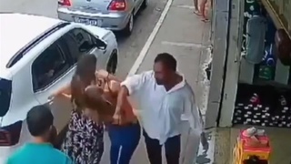 A guy punches a random woman in the face