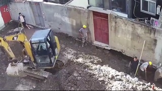 Workers are crushed by a wall