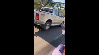 Motorcyclist Dragged By Truck Drive