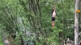 Woman falls from powerlines