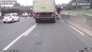 An old man, a scooter and a garbage truck