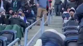 A clumsy fat guy at the football game