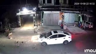 A motorcycle hits a car in Vietnam