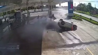 A guy slides into gas station