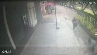 A bus hits a guy