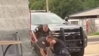 Cops help a unruly suspect see things differently