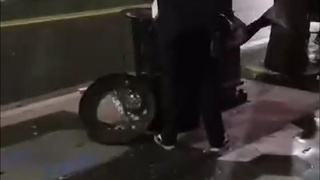 A man takes out a nightclubs trash