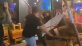 Girl knocked out in a bar fight