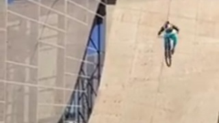 Mountain Biker Misses Ramp