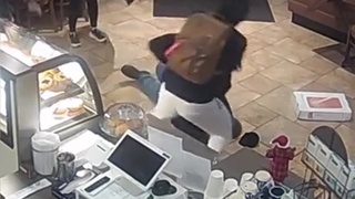 Barista stops robber armed with mace