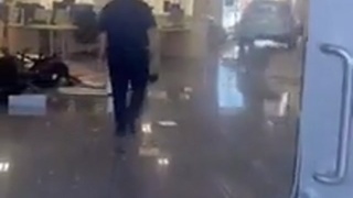 Customer Drives SUV Thru Carmax Showroom
