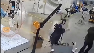 Robot Attacks Factory Workers
