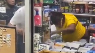 Asian shopkeepers defend themselves against Black mature female who goes behind the counter