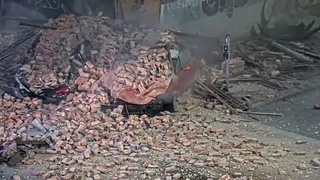 Bulding Collapses On Stoeln Car