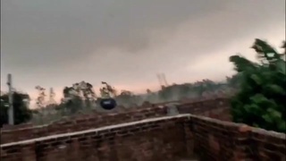 Man Flies in Storm