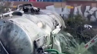 Train Explodes Septic Truck