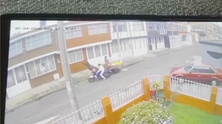Woman Runs Her Motorbike Into A Street Vendor