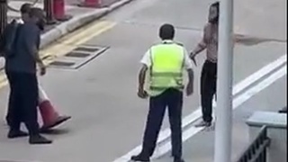 Derranged man with a knife stopped by bystanders and security guards in Hong Kong