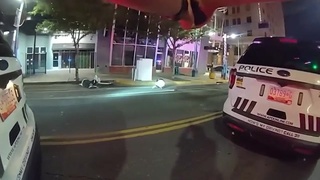 Shooting in front of police leaves one person dead and 3 others injured