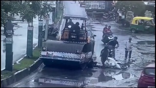 Scooter Passenger Run Over by Steam Roller
