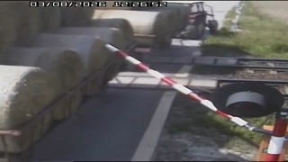 Tipsy Farmer on Tractor Hit by Train