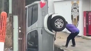 SUV  Tips Over Embankment