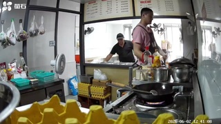 China man cooking on a slippy floor