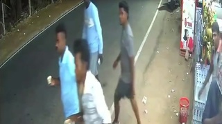 A parked motorcycle takes out Indian pedestrian