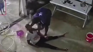 Indian electrician working in flooded basement